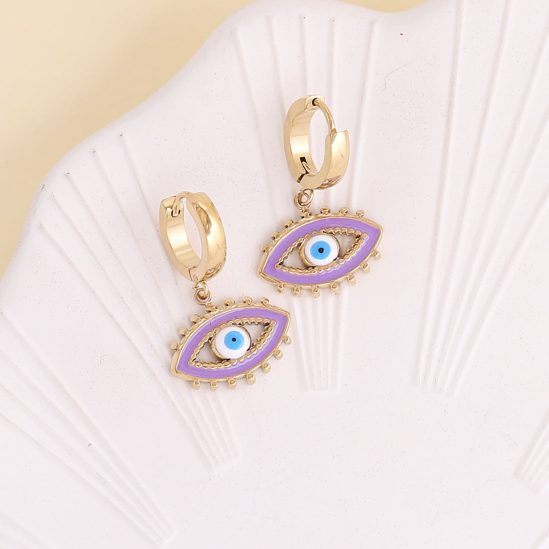 Pendientes de acero inoxidable de ojo de diablo de goteo de aceite de joyería al por mayor